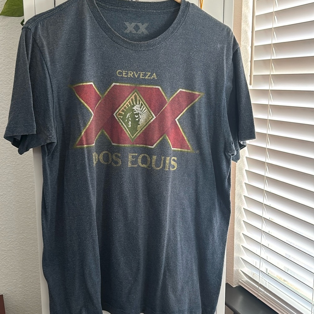 Dos Equis navy blue T-shirt.